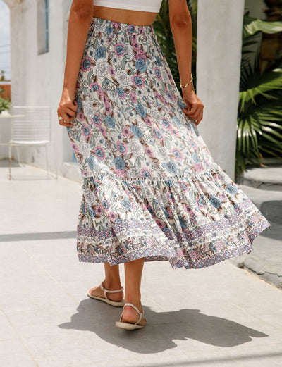 a woman in a dress holding an umbrella 