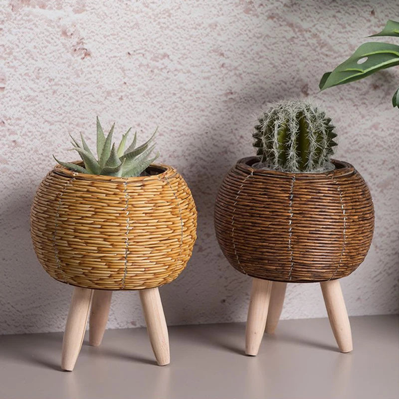 a group of vases sitting on top of a table 